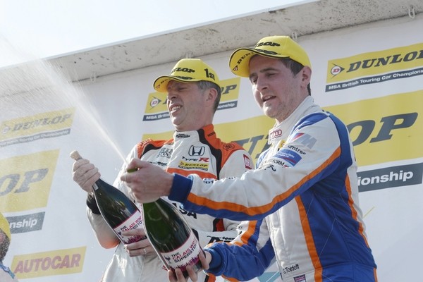 #25 Matt Neal and #600 Sam Tordoff celebrate on the podium after race three during the BTCC Oulton Park 4th-5th June 2016 at Oulton Park, Little Budworth, Cheshire, United Kingdom. June 05 2016. World Copyright Peter Taylor/PSP.