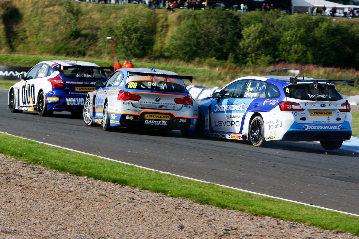 Colin Turkington (GBR) No.4 Subaru Team BMR Subaru Levorg GT & Robert Collard (GBR) No.100 Team JCT600 With GardX BMW 125i M Sport in the British Touring Car Championship Race 3 at Knockhill,Fife,UK on 14 August 2016. Lanyon/PSP Images