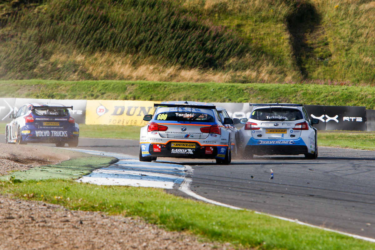 Colin Turkington (GBR) No.4 Subaru Team BMR Subaru Levorg GT & Robert Collard (GBR) No.100 Team JCT600 With GardX BMW 125i M Sport in the British Touring Car Championship Race 3 at Knockhill,Fife,UK on 14 August 2016. Lanyon/PSP Images