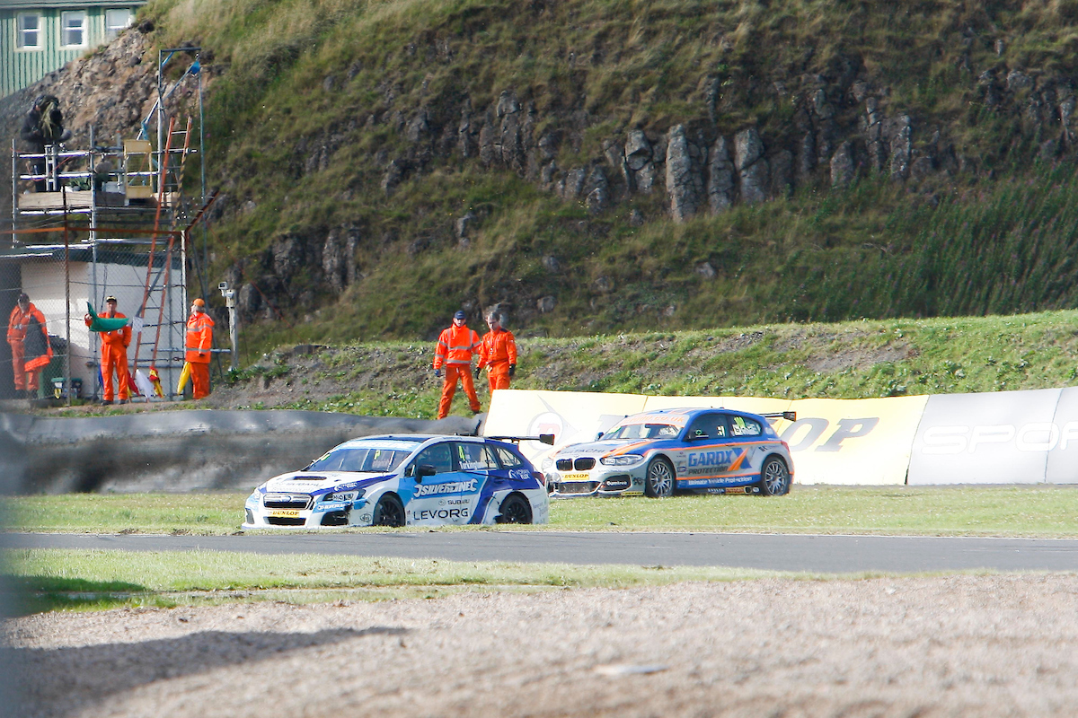 Robert Collard (GBR) No.100 Team JCT600 With GardX BMW 125i M Sport & Colin Turkington (GBR) No.4 Subaru Team BMR Subaru Levorg GT in the British Touring Car Championship Race 3 at Knockhill,Fife,UK on 14 August 2016. Lanyon/PSP Images